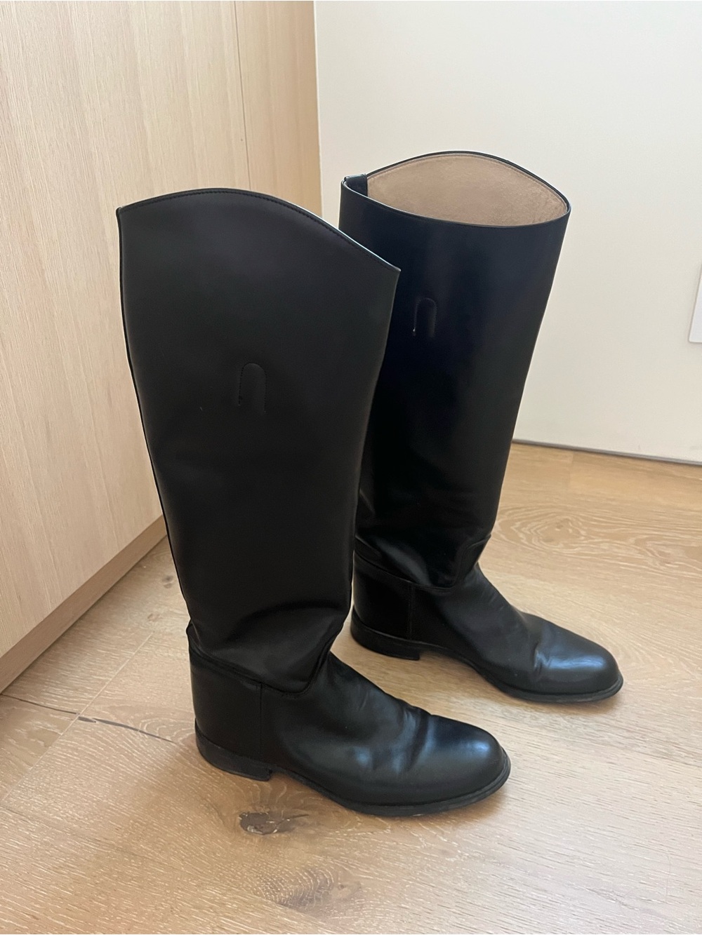 Black leather riding boots